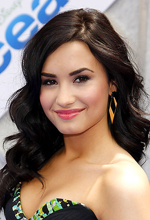 Wavy hair like Demi Lovato's tends to soften the angles of your face 